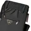 Fabricante Original 2025 Hombres Deportes Nuevo Recto Deportes Otoño e Invierno Pantalones Forrados de Polar y Engrosados Casual Moderno Pantalones Deportivos