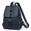 Mochila para Mujer 2025 Nuevo Estilo Moda Callejera Simple PU Bolsa para Computadora Gran Capacidad Mochila de Viaje Venta al por Mayor