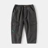 Pantalones para niños al por mayor 2024 nuevos pantalones casuales de color liso para niños moda coreana para bebés pantalones para niños entrega de una sola pieza