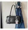 Bolso tote de nicho de alta gama estilo coreano 2026 para mujer, gran capacidad, bolso de hombro para ir al trabajo, bolso de mano moderno y versátil