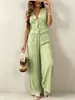 Conjunto de dos piezas estilo resort hecho a medida: Top sin mangas con cuello en V y cintura de corbata combinado con pantalones anchos fluidos