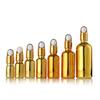 Botella de aceite esencial galvanizada al por mayor tapa de cesta de flores dorada pesca botella pequeña de medicina botella con gotero 30ml100ml botella de aceite esencial