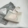 Bolsa de Gelatina Transparente para Mujer 2026 Nueva Moda Tendencia Primavera y Verano Bolso de Hombro Popular Simple Gran Capacidad Bolso Tote para Viajes