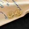Pendientes con hebilla de metal para mujer, ligeros, explosivos, de lujo, combinables con todo, elegantes, de uso diario, con un toque avanzado, irregulares y distintivos.