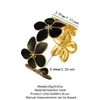 A pulseira aberta de aço inoxidável anti-gotejamento mais vendida da Temu é uma pulseira de aço titânio de luxo leve, nicho e de alta qualidade que não desbota