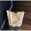 Bolsa Tote Simples de Mão Estilo Coreano Atacado Bolsa Feminina Verão 2025 Nova Grande Capacidade Ombro Único Lona Versátil Bolsa de Axila