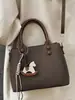 Bolso Pequeño Cuadrado Casual de Nicho Estilo Coreano para Mujer, Nuevo Elegante Bolso de Hombro Cruzado de Alto Valor Primavera 2026
