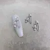 Accesorios para arte de uñas de aleación con forma de cruz gótica oscura transfronterizos, pendientes vintage europeos y americanos, accesorios de pedrería para uñas estilo punk gótico