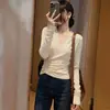 Camiseta de moda irregular elegante de manga larga con cuello en V plisado para mujer, adecuada tanto para llevar sola como debajo de otra prenda, nuevo top ajustado de principios de otoño 2026