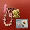 Chaveiro de Urso Panda Desenho Animado Ouro Puro 999 Pingente Dourado Popular para Pendurar no Carro Loja Shuibei Live do Tiktok Atacado