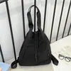 Mochila de cordón de nailon estilo minimalista japonés transfronteriza, casual y versátil, adecuada para estudiantes, clases, yoga, con múltiples opciones de transporte, también se puede usar como bolso de hombro