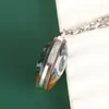 Llavero Colgante de Cristal Transfronterizo Ojo del Diablo Doble Cara Punk Metal Europeo y Americano Colgante de Llavero de Cristal