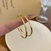 Novos brincos de argola de metal com agulha de prata, brincos de anel com elemento de padrão de diamante de temperamento, brincos de vento frio de alto senso, atacado
