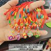 Puesto vendiendo joyería de Yiwu pulsera de cuerda colorida tejida a mano para el Festival del Bote del Dragón venta al por mayor bolsita dumplings cuerda de mano colorida