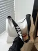 Bolsa de Dumpling da moda e versátil, famosa na internet, versão coreana para atacado, nova bolsa de mão de primavera, bolsa de ombro e transversal feminina para o dia a dia