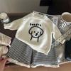 Ropa Infantil Estilo Coreano 2026 Nuevo Otoño Niñas Dibujos Animados Perro Cachorro Suéter de Punto Pantalones Rayados con Flecos Conjunto de Dos Piezas Manga Corta