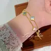 Nuevo Pulsera de Cuatro Hojas de Doble Capa Rosa Nácar Cadena Doble de Alta Gama Nicho Pulsera de Flor de Cuatro Hojas Mayoreo