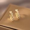 Pendientes de otoño nuevos de Dongdaemun coreanos de Cao Shi con perlas de imitación y hebilla de oreja de estilo coreano elegantes