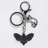 Explosiones Transfronterizas Ins Personalidad Viento Oscuro Dulce Fresco Plata Mariposa Cruzada Polilla Ahumada Llavero Colgante de Bolsa
