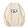 Sudadera de cuello redondo color albaricoque para mujer, nueva colección otoño/invierno, peso pesado, forrada de felpa, engrosada, con corte casual y holgado, y con un estampado floral azul de dibujos animados.