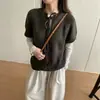 Toma real: Suéter tejido de punto con textura de trenzado tridimensional suave para mujer para otoño e invierno, cuello redondo, tapeta calada, manga corta, top de amarre