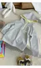 Moletom com Capuz Esportivo Color Block Solto Estilo Coreano para Meninas Nova Coleção Primavera 2026 Camiseta Básica Manga Longa Estilo Coreano Infantil Tendência