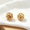 Cobre bañado en oro, circonita cúbica que retiene el color, colgante de bola de flor hueca de trébol de cuatro hojas en forma de corazón, accesorio para joyería DIY, pulsera, collar