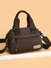 Bolsa Feminina Moderna e Estilosa 2026 Novo Modelo Simples Leve Bolsa de Ombro Versátil Impermeável Nylon Bolsa Transversal Bolsa de Mãe