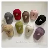 Sombrero de bebé para niños de Corea del Sur primavera y verano gorra de béisbol simple personalizada para niños y niñas estilo occidental gorra con visera de letras venta al por mayor