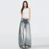 Jeans de pierna ancha lavados en azul claro para mujer, nuevo estilo otoño 2026, con diseño de bigotes de gato, corte holgado, efecto adelgazante y corte de pierna curva hasta el suelo