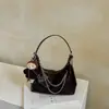 Bolso de hombro casual simple para mujer, nuevo bolso de moda para el verano 2026 para llevar debajo del brazo, bolso cruzado versátil para el trabajo, bolso de moda para mujer