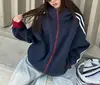 Sudadera con Capucha Rayada Versátil Americana para Hombres y Mujeres 2026 Nuevo Estilo Cardigan Deportivo Holgado Casual Chaqueta con Cremallera Moderna