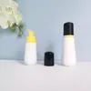 En stock botella cónica blanca de espuma de 60 ml, botella espumadora de PET para mousse de 100 ml, dispensador portátil de espuma facial