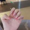 Nuevas tiras de arte de uñas listas para usar al por mayor redondas cortas estilo coreano lunares coloridos rosa nude lindo femenino arte de uñas
