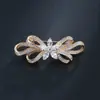 Moda coreana transfronteriza exquisito broche de circonita con lazo tridimensional al por mayor punto corsage pines accesorios de ropa