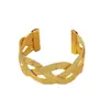 Pulsera Abierta Trenzada en Oro de Venta Caliente Transfronteriza Europea y Americana, Lujo Ligero, Sensación de Alta Gama, Versión Ancha, Joyería Geométrica de Moda para Mujeres