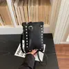 2026 Nueva Moda Transfronteriza Bolso para Teléfono Móvil Estilo Coreano Bolso Cruzado con Remaches Bolso de Hombro Bolso Casual de Color Sólido para Mujer