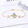 Pulseira de Trevo Vazado Totalmente Cravejada com Zircônia Prateada 925 Sterling Prata para Mulheres Design de Nicho Sentido de Design Joia de Mão Transfronteiriça Presente de Aniversário