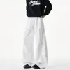 Pantalones casuales de primavera y otoño con diseño curvo, estilo retro americano deconstruido, pantalones deportivos holgados de pierna ancha recta para hombre con pliegues