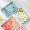 Temblando el mismo estilo 33 rejilla Cubo de hielo Cubo de hielo Molde de grado alimenticio Hockey sobre hielo redondo con tapa Refrigerador doméstico Cubo de hielo congelado Artefacto