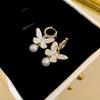 Pendientes de plata con forma de mariposa y flor de perla retro francesa, pequeños y exquisitos, de alta gama, con diseño de hada súper dulce para mujer.
