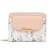 Cartera pequeña de solapa minimalista japonesa y coreana, billetera corta de PU floral para mujer, tarjetero integrado, cartera de mujer estilo ins