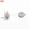 Venta al por mayor del fabricante Acero Inoxidable Presión de Aceite Colgante Cabeza Humana DIY Estilo Europeo y Americano Colgante Personalizado Accesorios de Joyería DIY