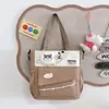 Bolsa de estudo de desenho animado estilo floresta estilo faculdade, alta aparência, mochila de estudo casual de grande capacidade para alunos do ensino fundamental II e médio