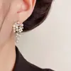 Pendientes de Borla de Perla con Pétalos Incrustados de Diamantes de Moda Sencilla para Mujer con Lujo Ligero y Diseño Único Pendientes al por Mayor
