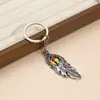 Collar Personalizado Ojo de Diablo con Pluma, Llavero de Coche de Acero Inoxidable de Nicho, Cadena Decorativa para Suéter