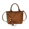 Bolso de hombro versátil, bolso de mano de alta gama de moda, bolso cubo de gamuza de nicho para el día a día, bolso cruzado de otoño e invierno