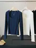 Camiseta cuadrada de estilo coreano de dos piezas falsas para mujer, nuevo diseño de otoño con detalle de chal, escote en la clavícula expuesta, ajustada, top corto de abrigo
