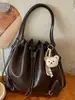Shuai Mi Home Bolso Cubo de Moda Coreana con Cordón Simple 2026 Nuevo Nicho de Moda de Alto Valor Bolso de Hombro