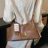 Bolso de axila retro de gran capacidad transfronterizo para mujer, nuevo bolso tote simple 2026, bolso versátil de hombro y cruzado para el día a día